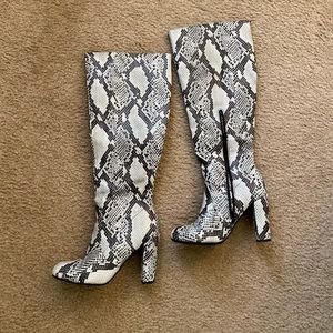 Snakeskin heeled boots
